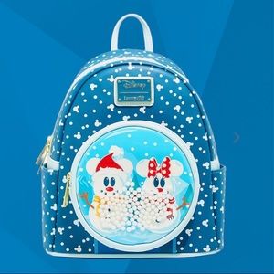 A brand new never opened Loungefly Mickey and Minnie Backpack!!!